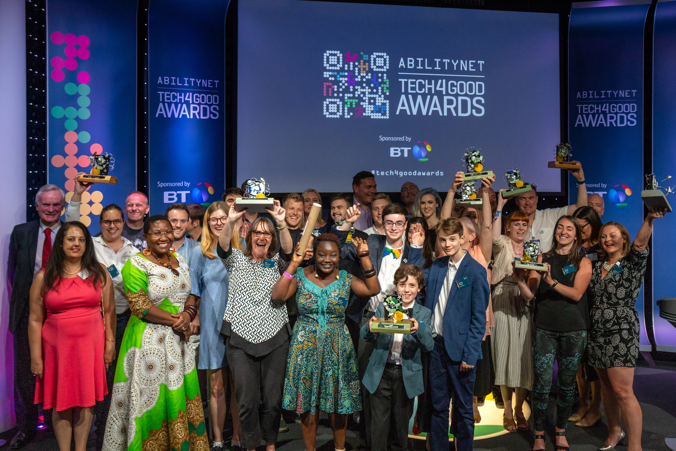 The 2018 AbilityNet Tech4Good Awards winners alongside presenters and judges