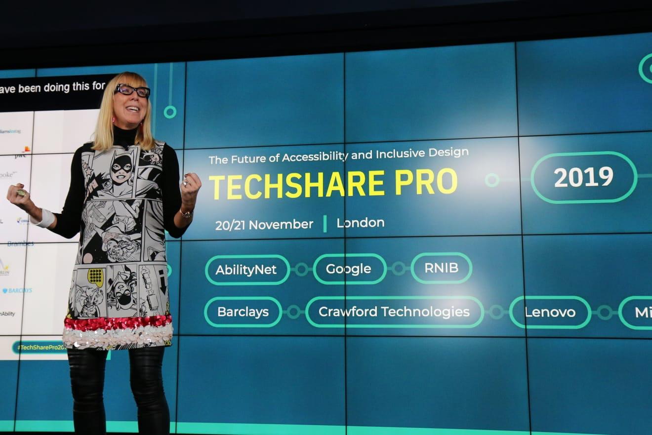 Caroline Casey on stage at TechShare Pro 2019 in her "killer" dress