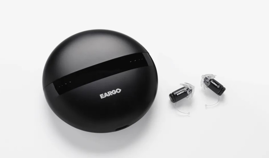 EarGo 6 Hearing Aids with black round charger
