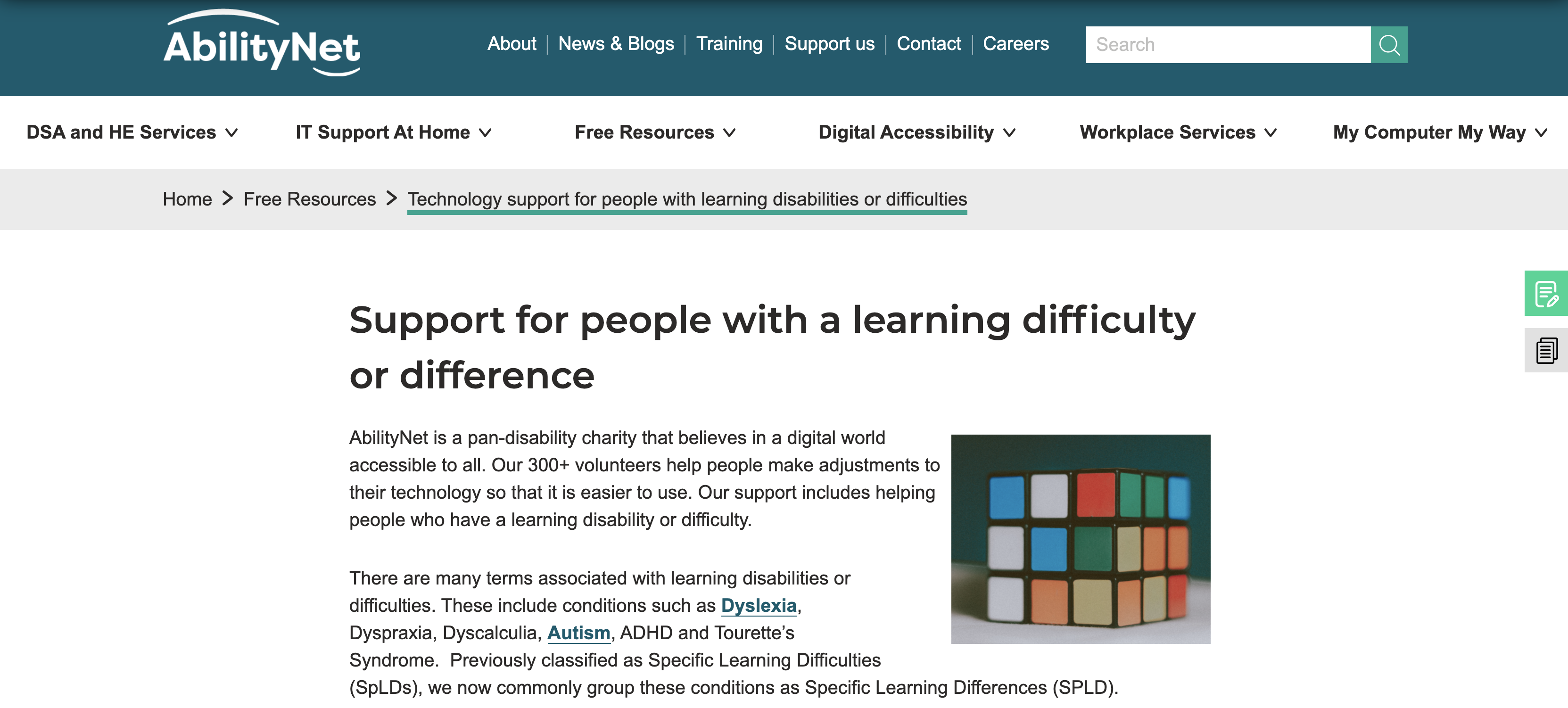 Image shows the AbilityNet learning disabilities section of our website. There is a picture of a Rubik's cube on the screen