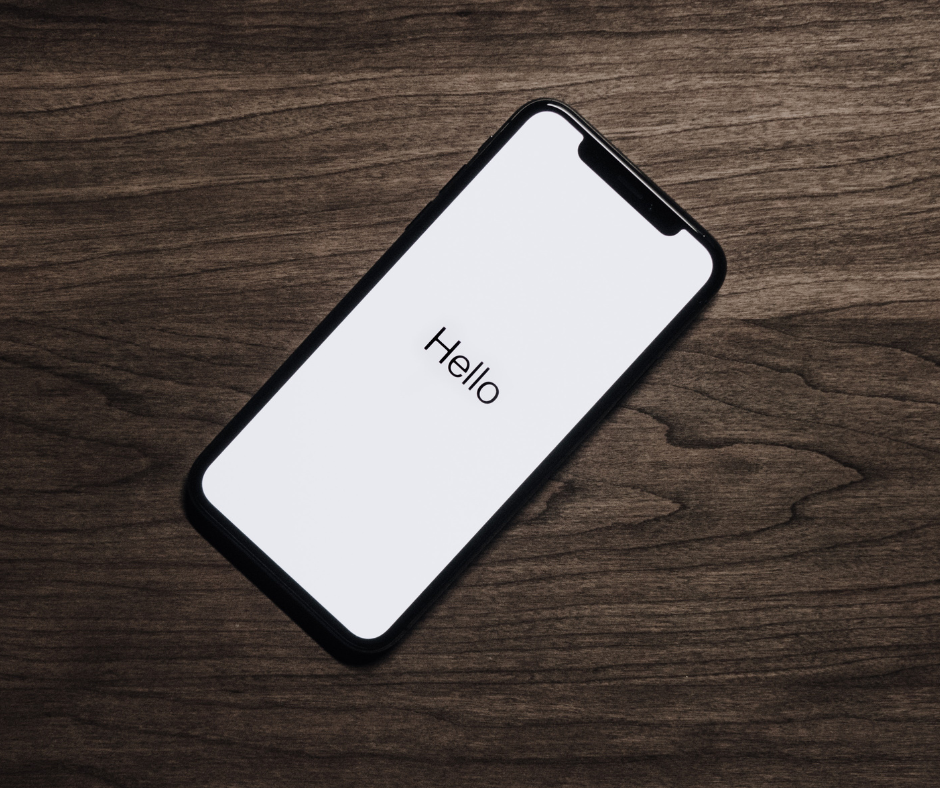 An iPhone with the 'hello' screen loaded.