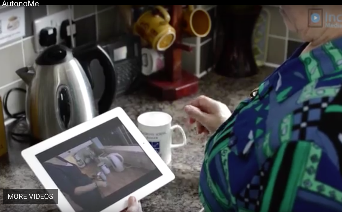 a lady uses autonome in her kitchen to learn how to use her kettle