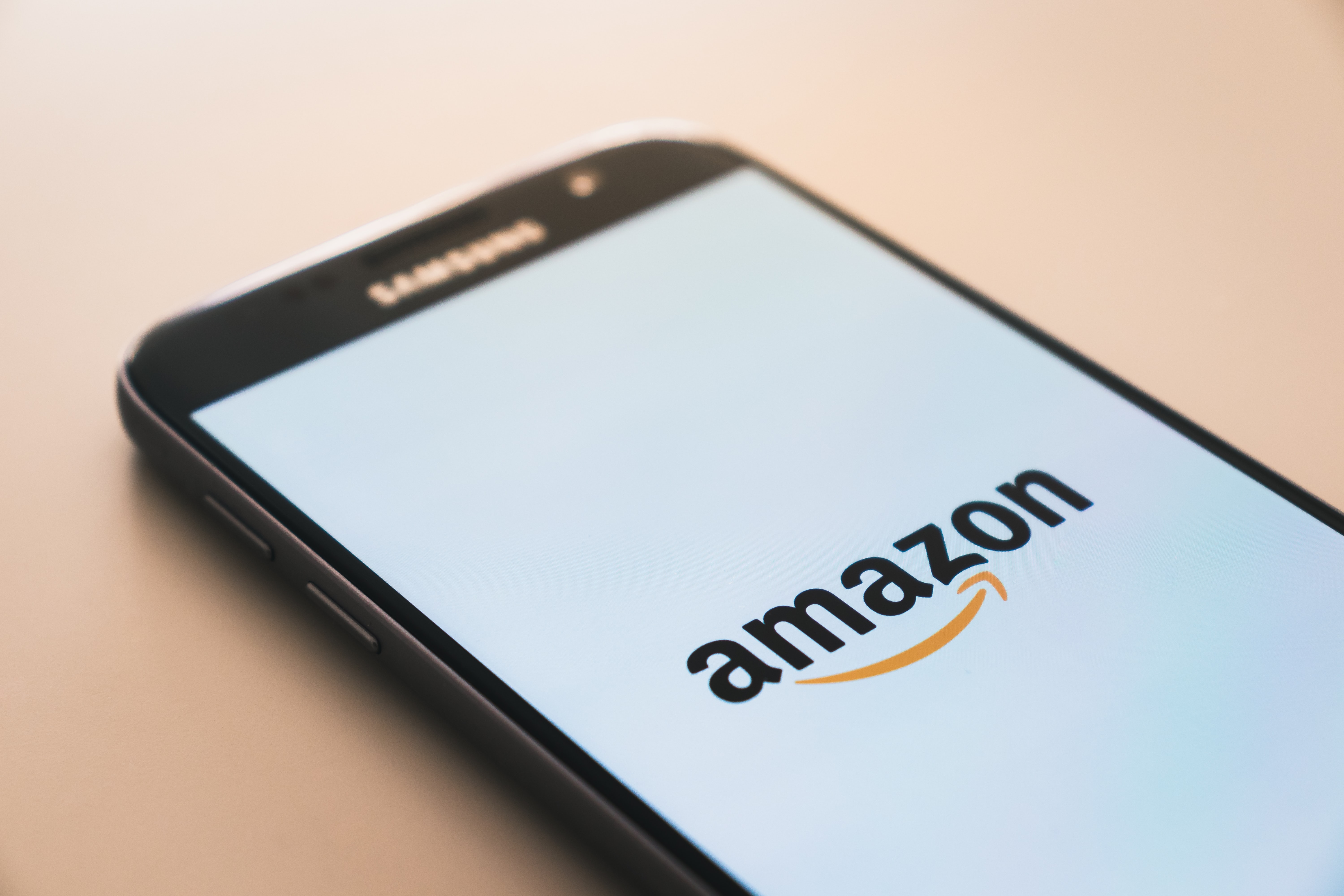 Amazon logo on a smartphone screen