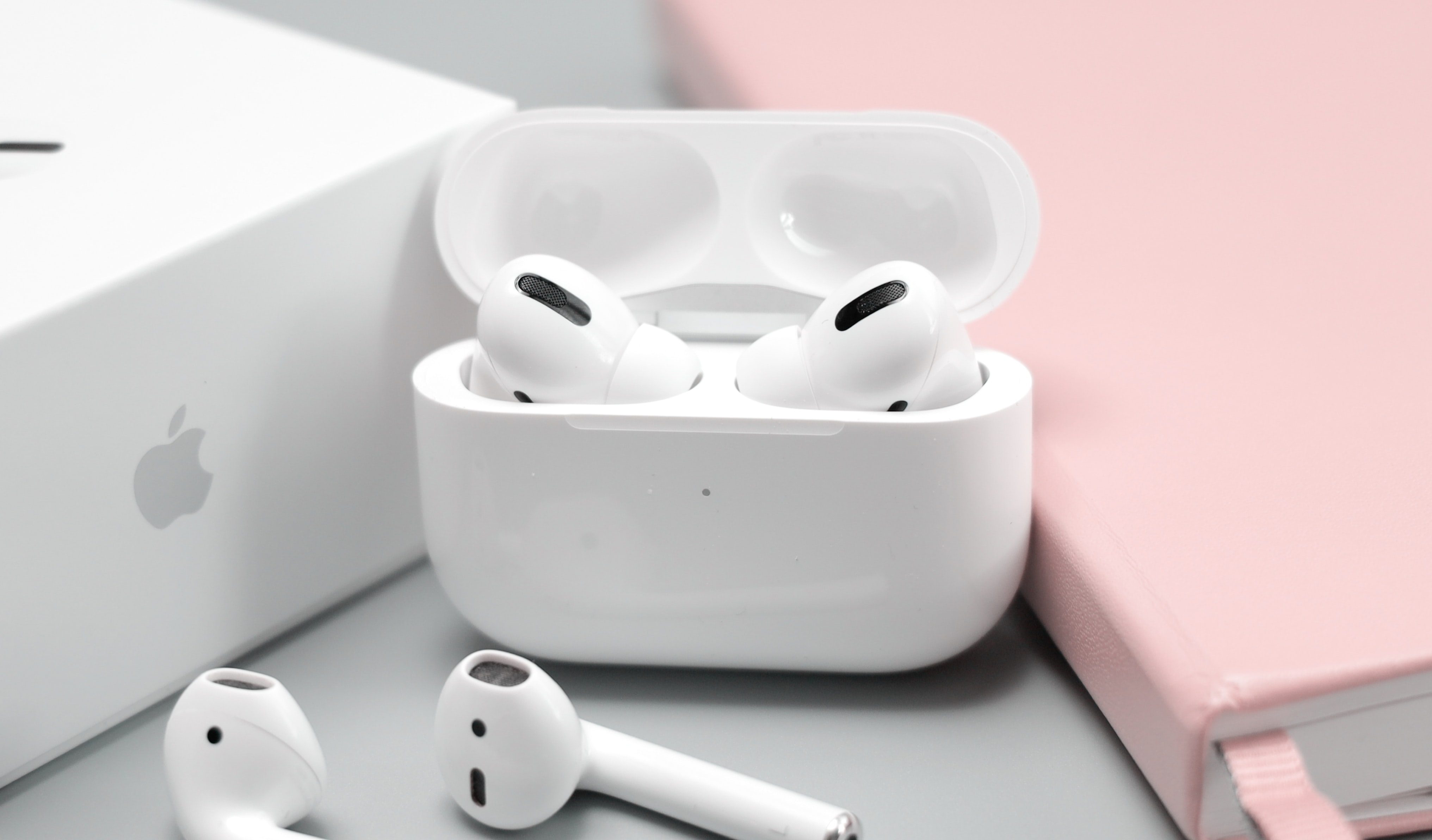 Apple Airpods up close shot with packaging in background
