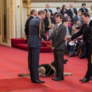 Image of Robin Christopherson receiving his MBE from The Duke of Cambridge