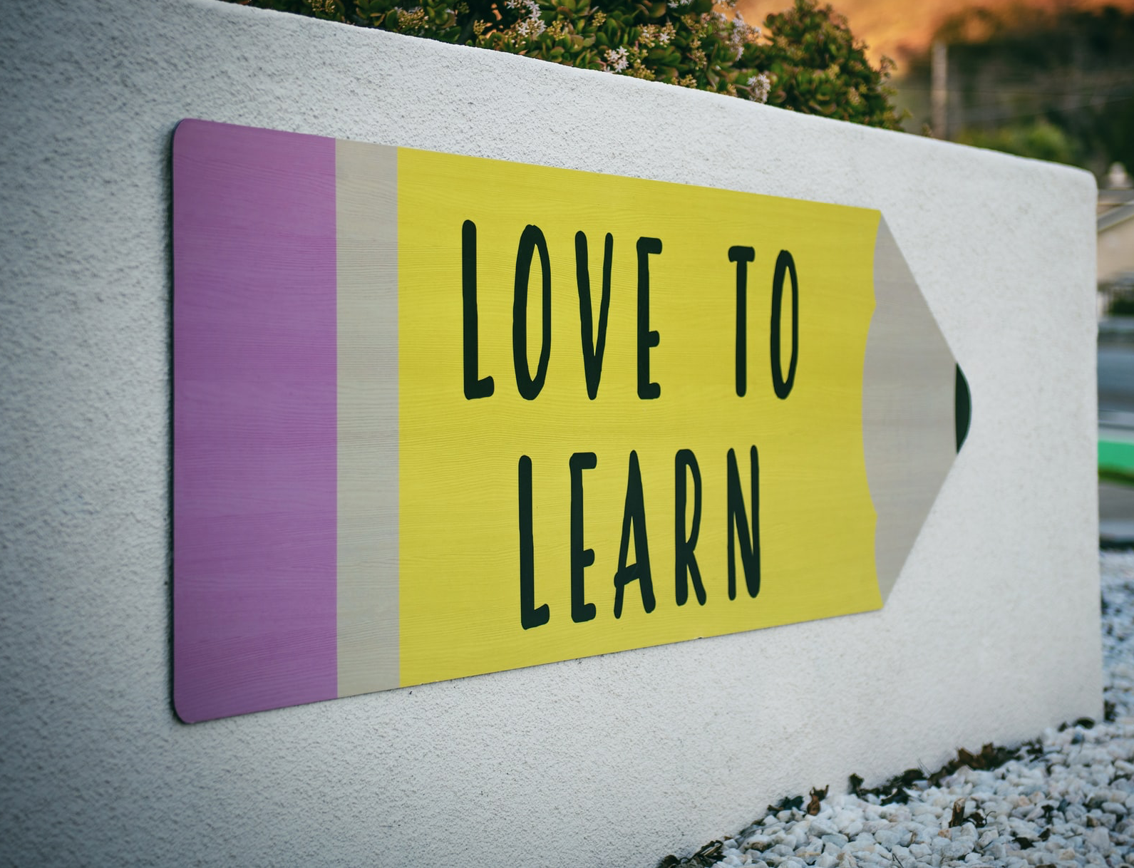 sign saying Love to Learn