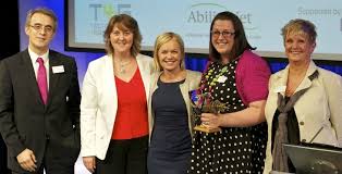Image shows members of starting point receiving their Tech4Good Award