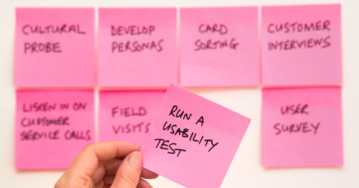 Set of 8 post it notes with one in the foreground reading 'Run a usability test'