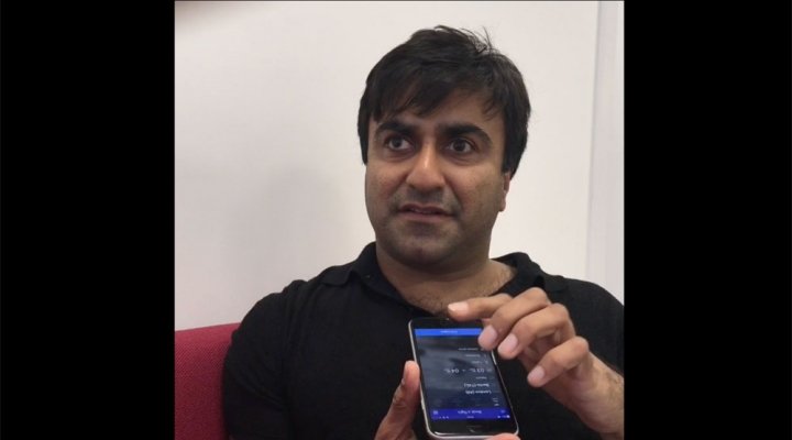 Adi Latif uses screenreader on mobile phone